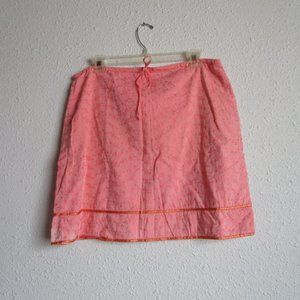 Light orange cotton skirt with drawstring waist. 18 inches from waist to hem.